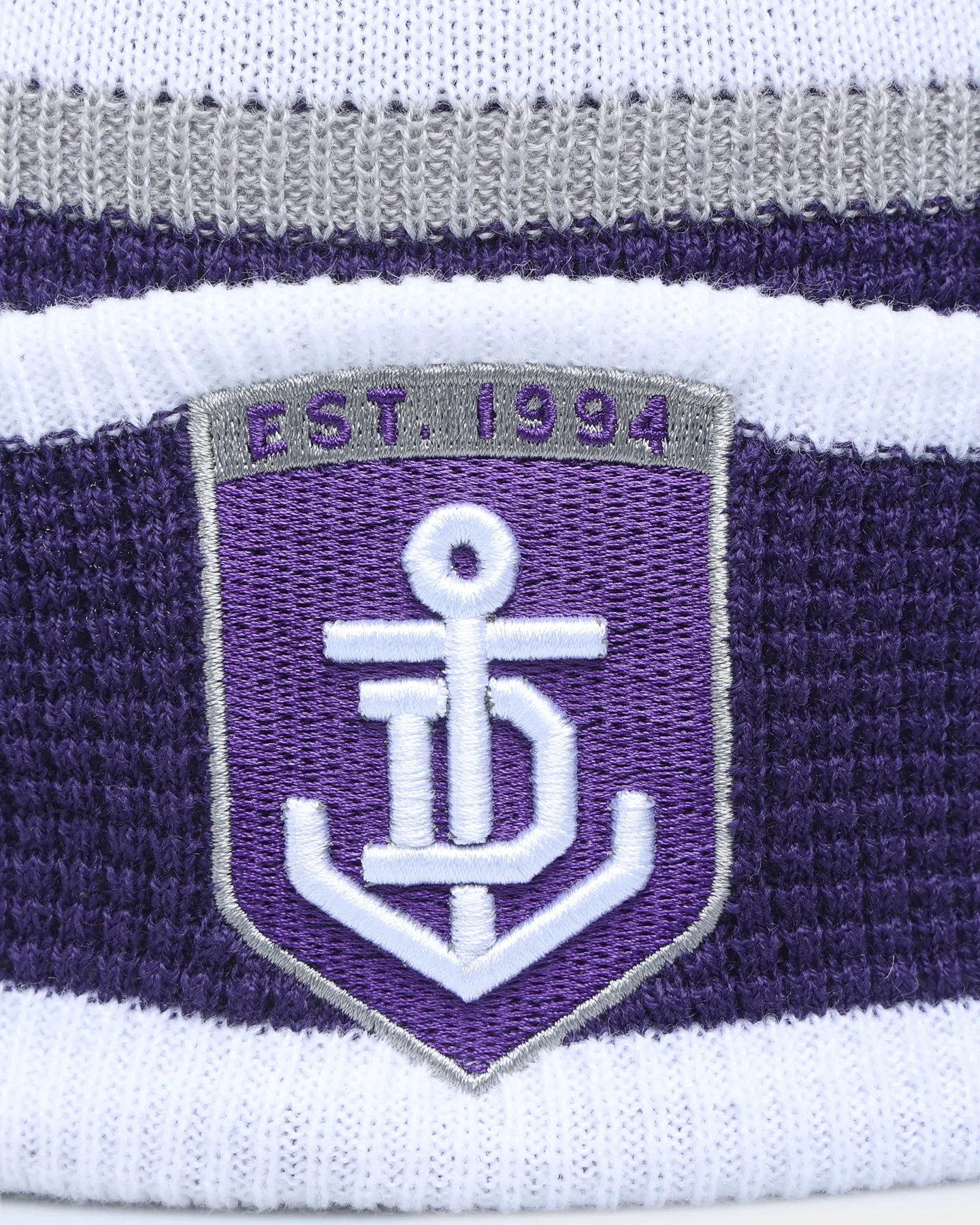 New Era Fremantle Dockers AFL Opening Bounce 2022 Pom Waffle Wordmark Beanie Purple