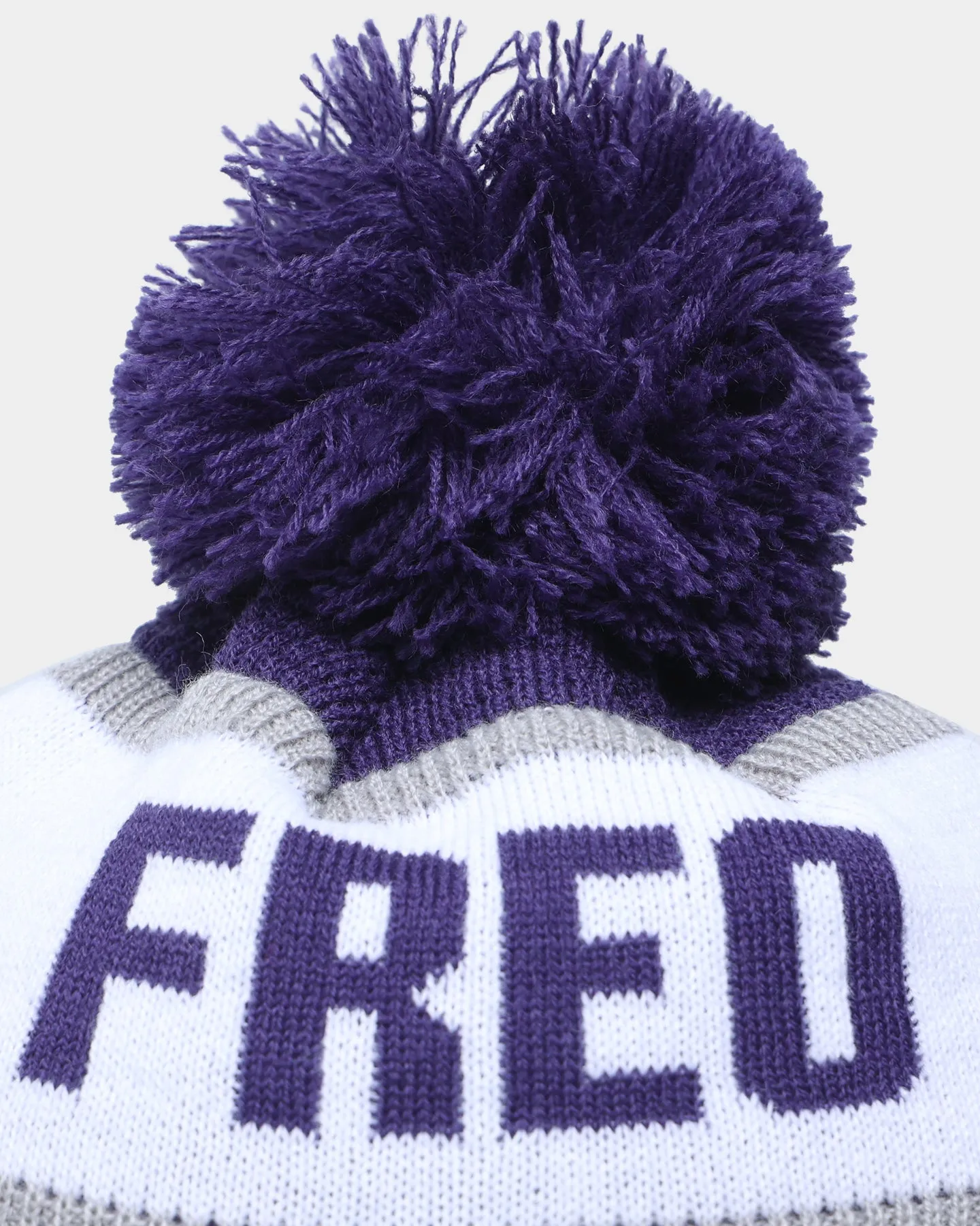 New Era Fremantle Dockers AFL Opening Bounce 2022 Pom Waffle Wordmark Beanie Purple