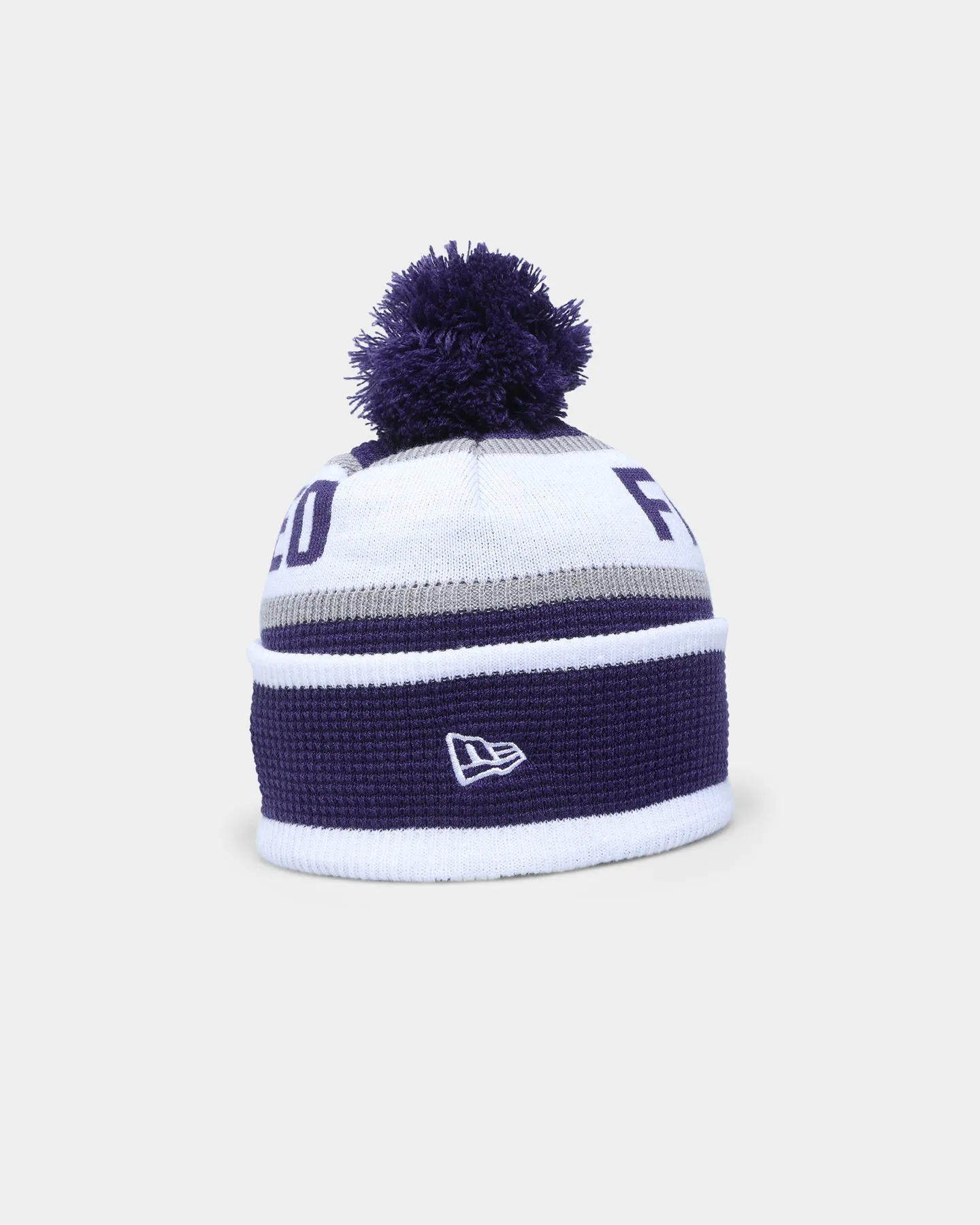 New Era Fremantle Dockers AFL Opening Bounce 2022 Pom Waffle Wordmark Beanie Purple